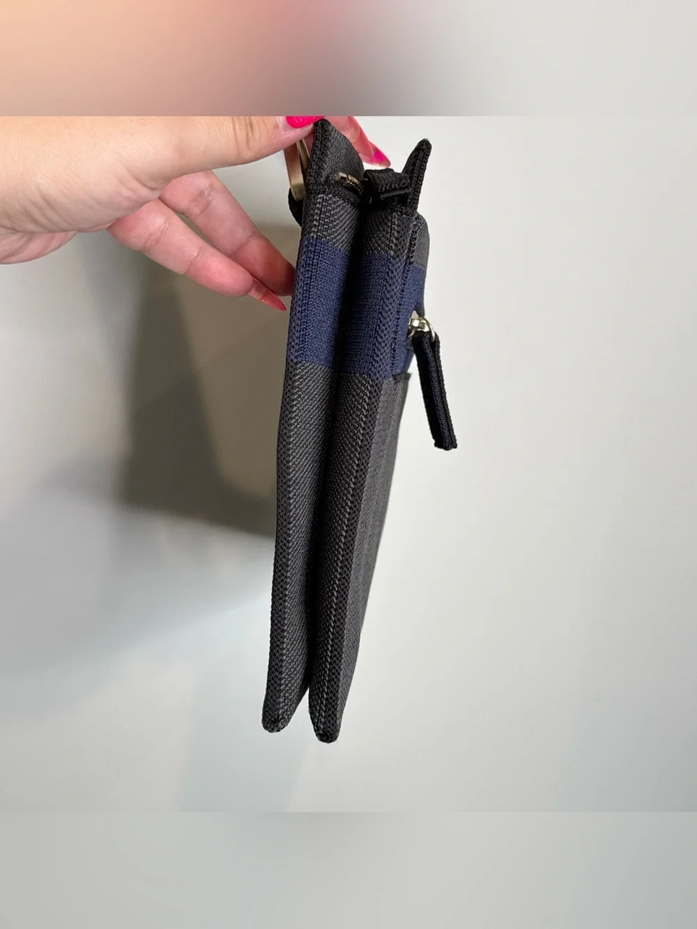 Rothy’s dark gray and blue fabric crossbody clutch or shoulder bag